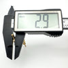 Caliper reading showing 2.9mm depth of vintage 9ct gold T-bar pendant