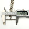 Calipers measuring the sterling silver T-bar length on the Albert chain (43.25mm shown).