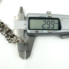 Calipers measuring the sterling silver T-bar thickness on the Albert chain (2.99mm shown).