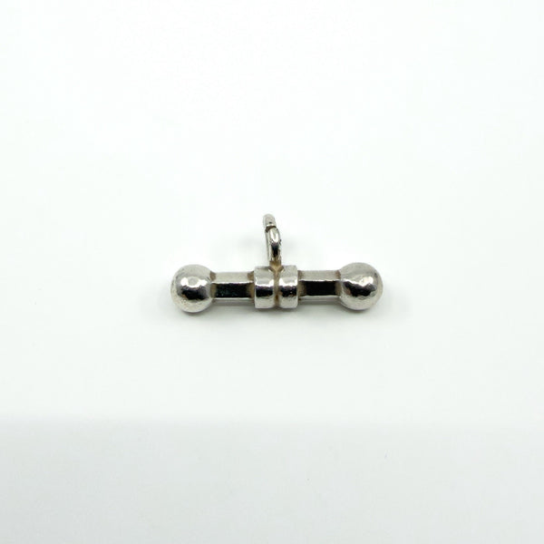 Chunky sterling silver T-bar charm photographed flat to show the full shape and finish.