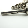 Side close-up of the T-bar showing the stamped markings on the antique sterling silver Albert chain.