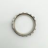 Overhead view of antique silver garnet ring showing circular shape and profile