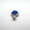 Oval blue chalcedony cabochon pendant set in double rope bezel silver