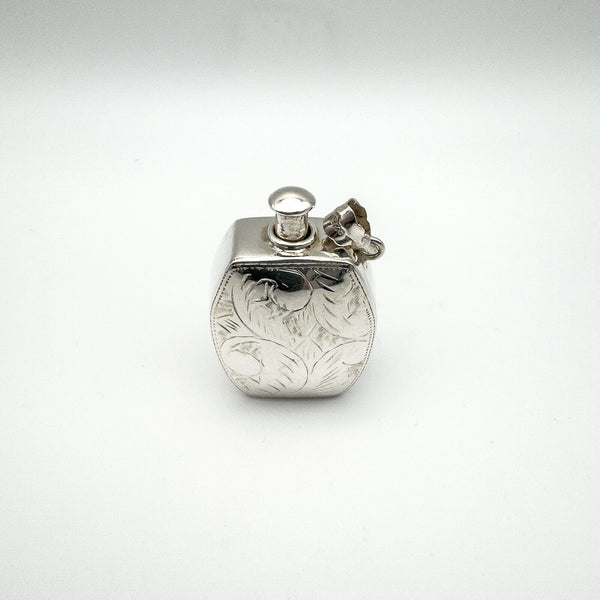 Sterling silver perfume or poison bottle pendant viewed from above with secure screw top