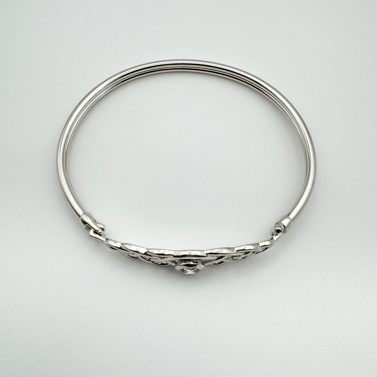 Overhead view showing oval shape and full band of sterling silver bangle