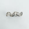 Five marquise-cut CZs in a curved silver band setting