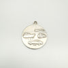 Silver pendant reverse with travel symbols and SILVER stamp