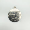 Reverse of silver pendant featuring plane, train, car and boat travel icons