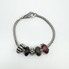 Trollbeads sterling silver foxtail bracelet with 5 assorted charms
