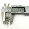 Digital caliper showing the brooch width at approximately 17.17mm for the sterling silver turquoise brooch.