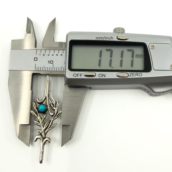 Digital caliper showing the brooch width at approximately 17.17mm for the sterling silver turquoise brooch.