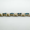 Rear view of blue CZ bracelet showing silver X link structure
