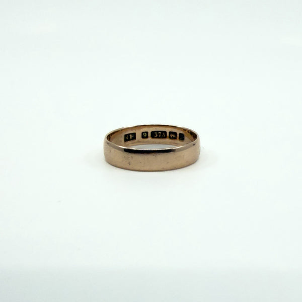 Victorian 9ct rose gold full band ring showing Birmingham 1900 hallmarks inside the band.