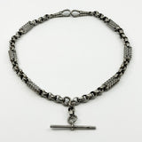 Front view of an antique Victorian sterling silver Albert chain with T bar and two dog clips