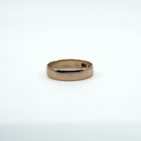Front profile of a Victorian 9ct rose gold band ring with smooth polished finish.