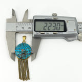 Digital caliper showing the Victorian 18ct gold turquoise tassel locket measuring approximately 22.30mm wide.