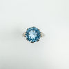 Vintage sterling silver ring with blue topaz solitaire