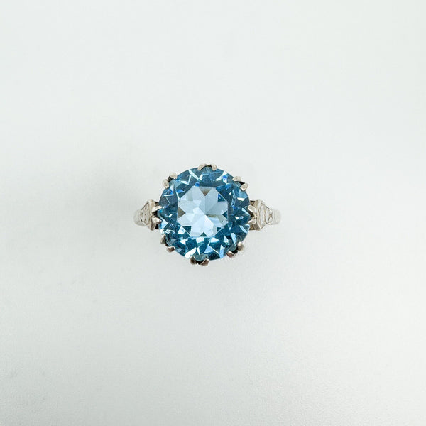 Vintage sterling silver ring with blue topaz solitaire