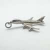 Detailed sterling silver pendant shaped as a Boeing 747 aircraft with stamped markings