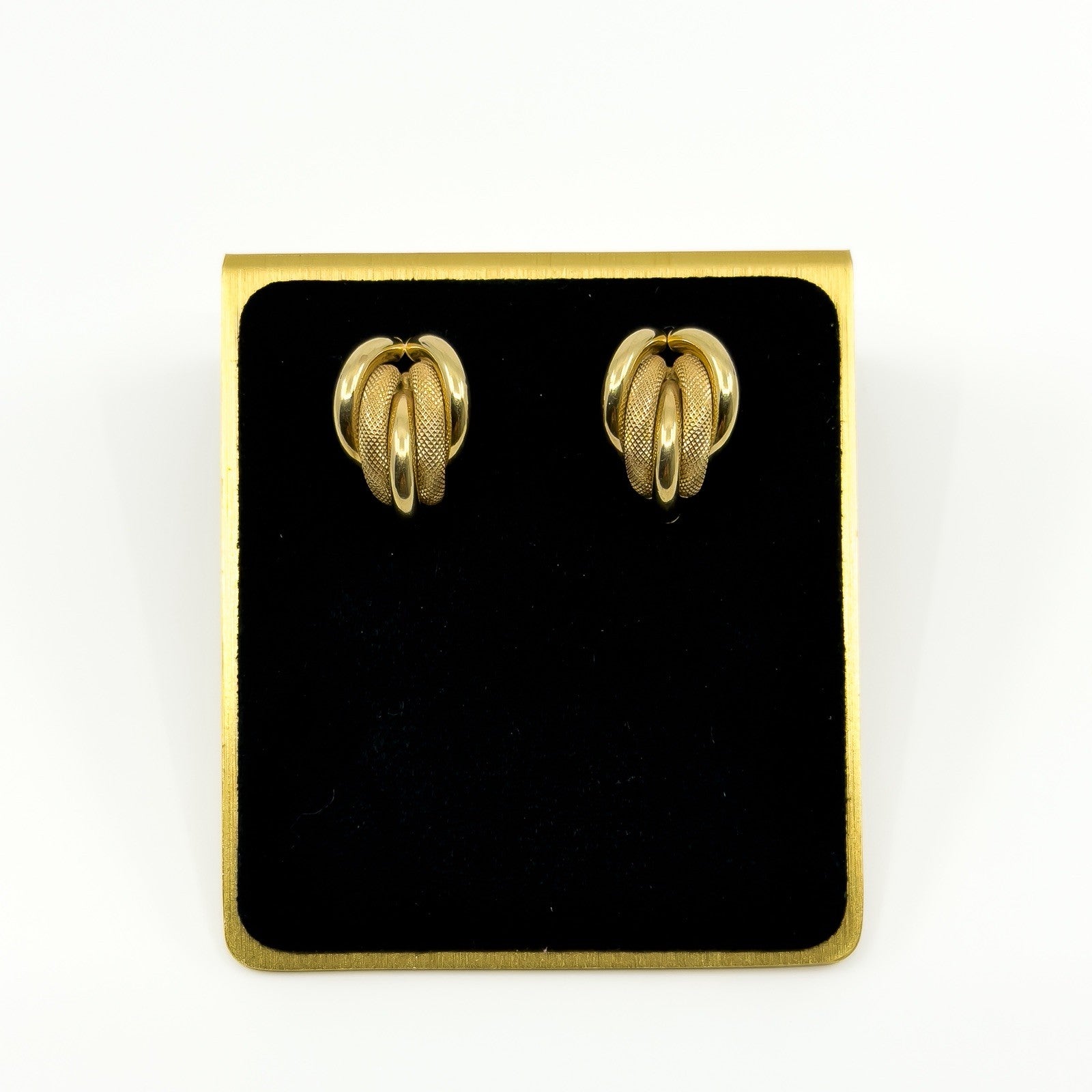 Pair of vintage 9ct gold half hoop earrings with five curved strands in polished and mesh-textured finishes.