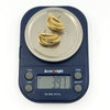 Pair of vintage 9ct gold chunky half hoop earrings shown on digital scales weighing approximately 3.97g.