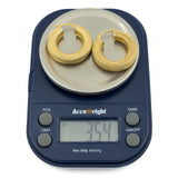 Large vintage 9ct gold mesh hoop earrings shown on scales weighing approximately 3.54g together.