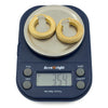 Large vintage 9ct gold mesh hoop earrings shown on scales weighing approximately 3.54g together.