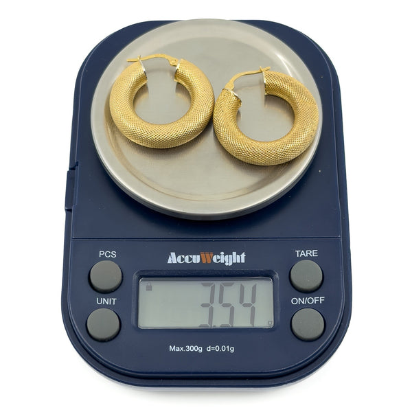 Large vintage 9ct gold mesh hoop earrings shown on scales weighing approximately 3.54g together.