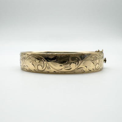 Chunky vintage 9ct rolled gold bangle with foliate engraved design