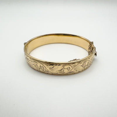 Vintage gold bangle side angle showing push clasp mechanism