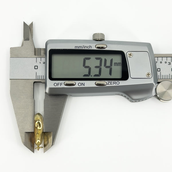 Vintage 9ct gold lucky bean charm pendant measured at approximately 5.34mm deep with digital calipers.