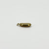 Edge view of vintage 9ct gold lucky bean charm pendant showing the rounded hollow construction and hoop fitting.