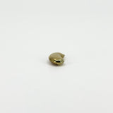 End view of vintage 9ct gold lucky bean charm pendant showing its rounded three-dimensional kidney bean form.