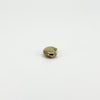 End view of vintage 9ct gold lucky bean charm pendant showing its rounded three-dimensional kidney bean form.