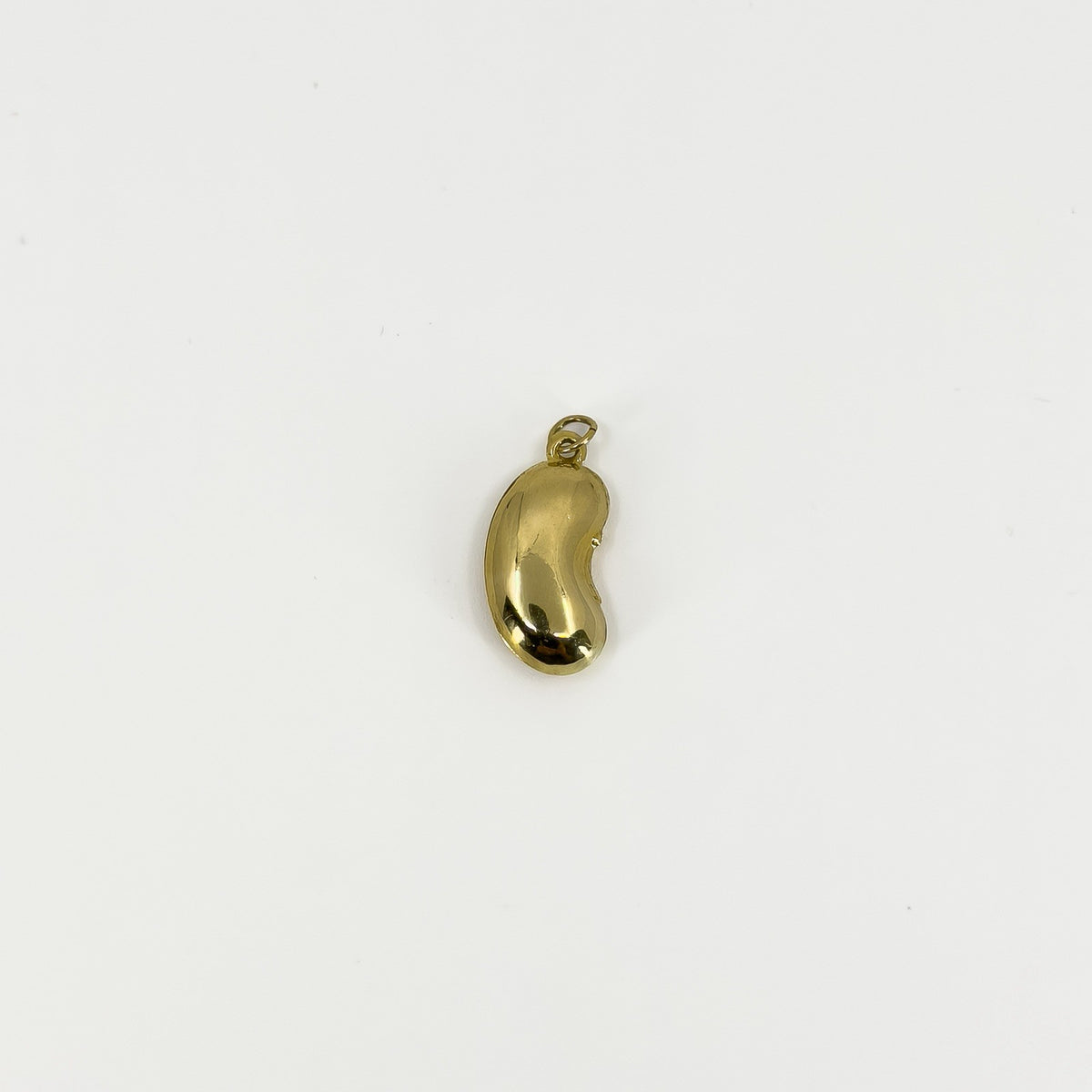 Front view of vintage 9ct gold lucky bean charm pendant with polished kidney bean shape and suspension hoop.