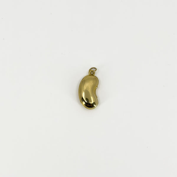 Front view of vintage 9ct gold lucky bean charm pendant with polished kidney bean shape and suspension hoop.