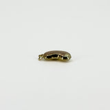 Profile view of vintage 9ct gold lucky bean charm pendant showing the depth and curved kidney bean shape.