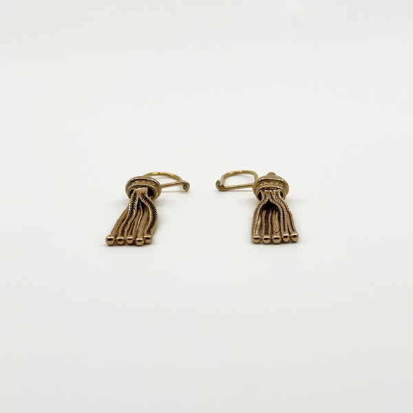 Low front view of the 9ct rose gold Albertina earrings showing the flexible tassel chains and rounded ends.