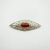 Vintage sterling silver brooch with oval carnelian and Celtic-style openwork