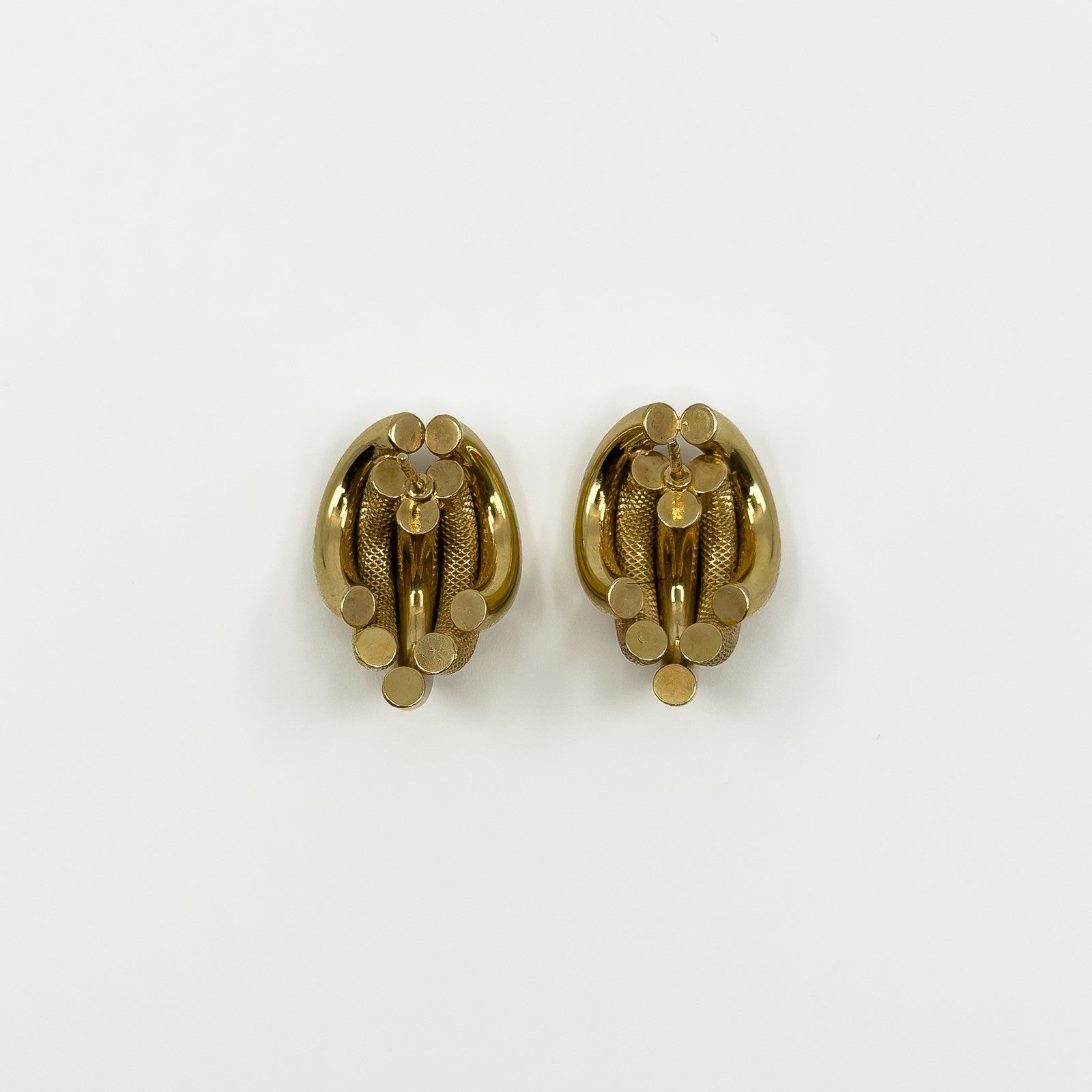 Back view of vintage 9ct gold half hoop earrings showing the curved five-strand construction and post fittings.