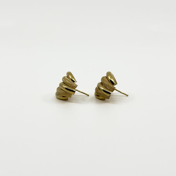 Angled view of vintage 9ct gold half hoop earrings showing the chunky curved mesh and polished strands.