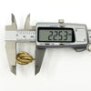 Digital caliper showing a vintage 9ct gold chunky half hoop earring measuring approximately 22.53mm long.