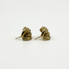 Side view of vintage 9ct gold half hoop earrings showing polished and mesh-textured curved strands.