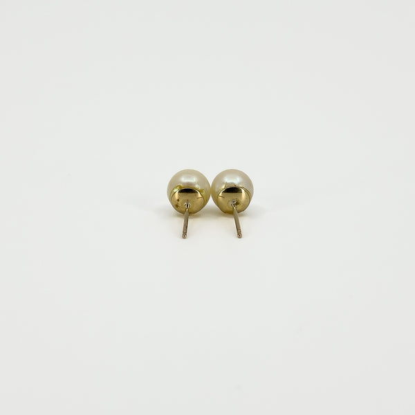 Rear view of vintage 9ct gold cultured pearl studs showing the gold settings and post fittings without backs.
