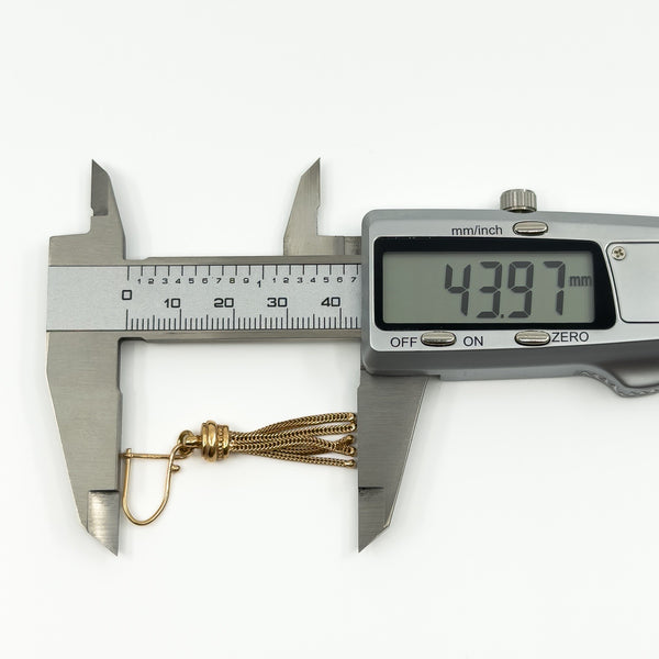 Digital caliper showing one vintage 9ct rose gold Albertina tassel earring measuring approximately 43.97mm long.