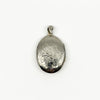 Vintage sterling silver oval engraved photo locket with polished bail and foliate detail