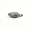 Side profile of the vintage sterling silver puffy heart photo locket showing its depth.
