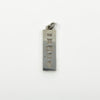 Hallmark close up on vintage sterling silver ingot pendant with Birmingham 1977 marks