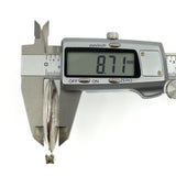 Side measurement of a vintage sterling silver oval locket showing 8.71mm depth