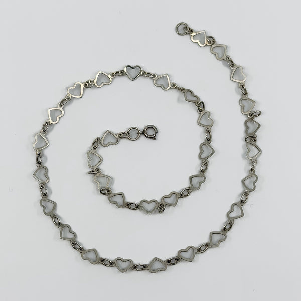Vintage sterling silver open heart link necklace with spring clasp, shown in full flat layout